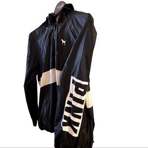 - PINK windbreaker/ hooded rain jacket. Size M-L